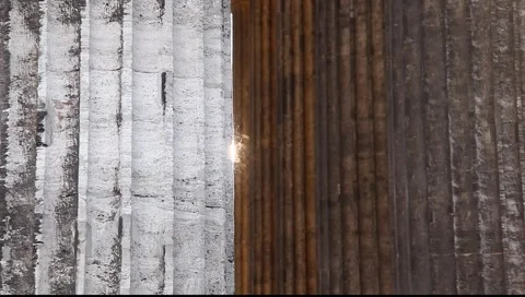 Dust in bay between columns, lit by sunrays. Stock Footage 6361551