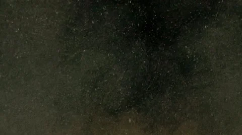Dust on black background Stock Footage 68890222