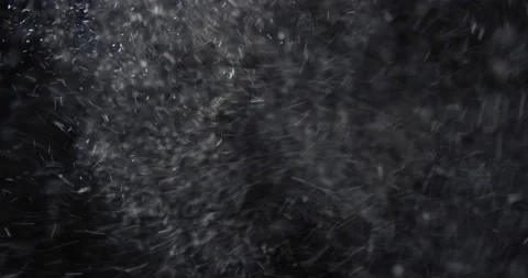 Dust on a black background Stock Footage 237884520