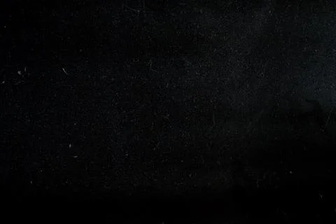 Dust on a black background Stock Photos
