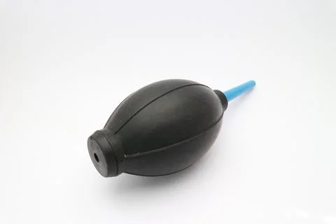 Dust blower for digital camera Stock Photos