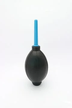 Dust blower for digital camera Stock Photos