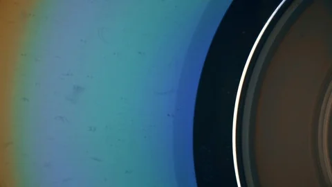 Dust on a CD. CD shimmers. multicolored light Stock Footage 103428548