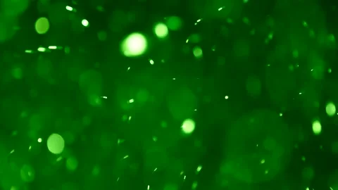Dust, circles, bokeh effect randomly moving in different directions on a gr.. Stock Footage 250626981