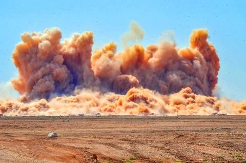 Dust cloud after the blast Stock Photos