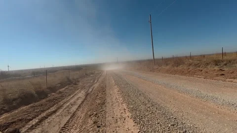 Dust Cloud Hanging Over Rural Gravel Road in Oklahoma Stock Footage 335140215