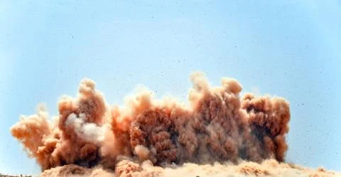 Dust clouds after the blast Stock Photos