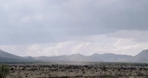 Dust Clouds Passing By - West Texas Stock Footage 256049516