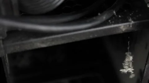 The Dust on the computer. Dust on a black digital device. Stock Footage 172048150