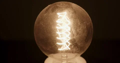 dust covered incandescent light bulb bri... | Stock Video | Pond5