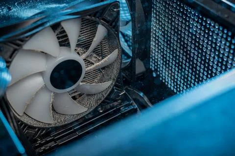 Dust on CPU cooling fan inside of a PC computer Stock Photos
