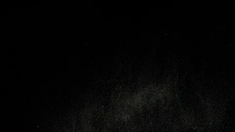 Dust curtain falling from top of frame Stock Footage 76463757