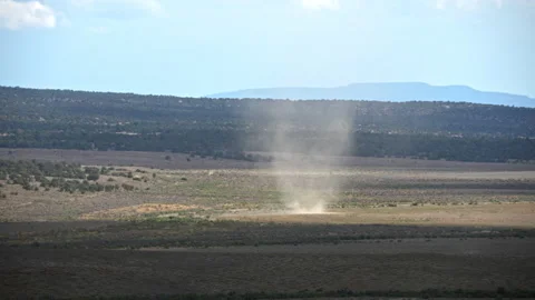 Dust devil moving over the Utah desert in slow motion Stock Footage 203839724