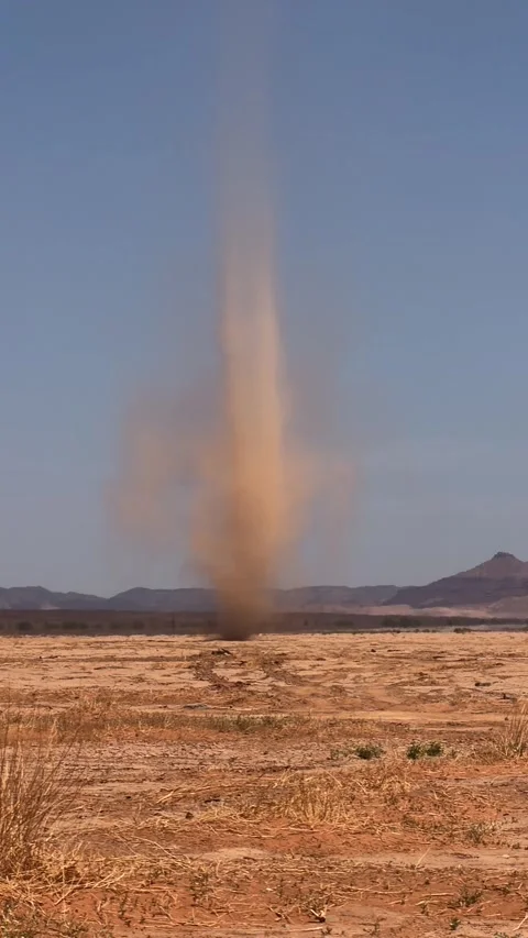 Dust devil tornado in Moroccan desert landscape Stock Footage 334538929