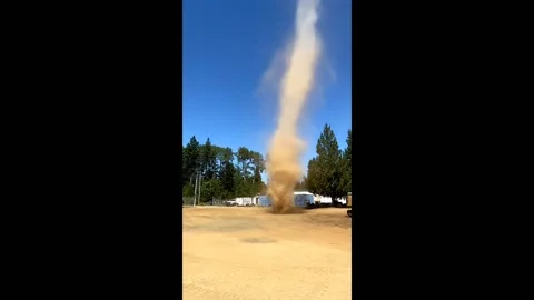 Dust devil whirls into action at Comox Valley job site, Canada Video stock 260326991