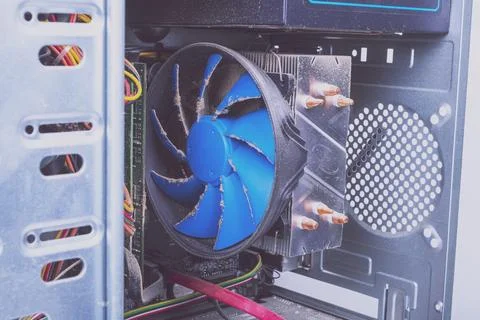 Dust that eventually settles on the computer's cooling processor. Cleaning .. Stock Photos