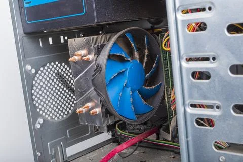 Dust that eventually settles on the computer's cooling processor. Cleaning .. Stock Photos