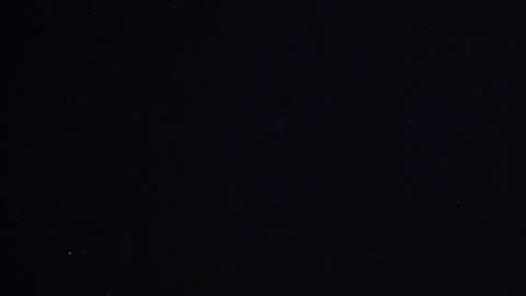 Dust floating in the air against a dark background. Polluted air. Stock Footage 135443724