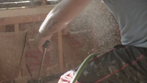 Dust is floating as a construction worker works Video stock 146195150
