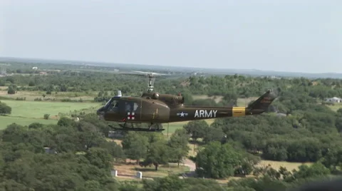 Dust Off flying pull and rack to gunship machine gun Stock-Footage 45576944