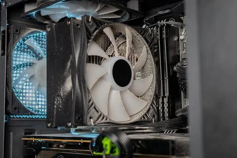 Dust inside of a broken computer. complication of the PC. fan and other computer Stock Photos