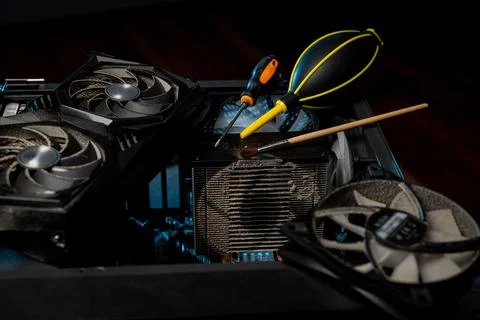 Dust inside of a broken computer. complication of the PC. fan and other computer Stock Photos