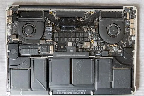Dust inside a laptop computer. The cause of computer overheating Stock Photos