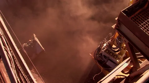 Dust as ore falls in Stock Footage 55043057