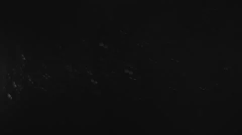 Dust paricles against black background Stock-Footage 46511348
