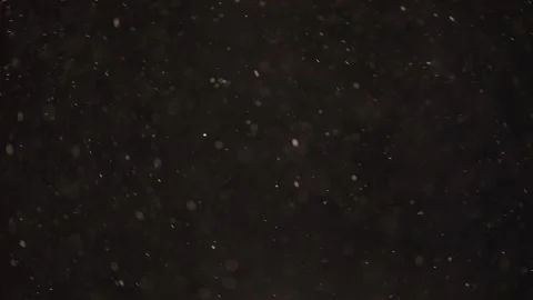 Dust particles in the air, black background Stock Footage 139356500