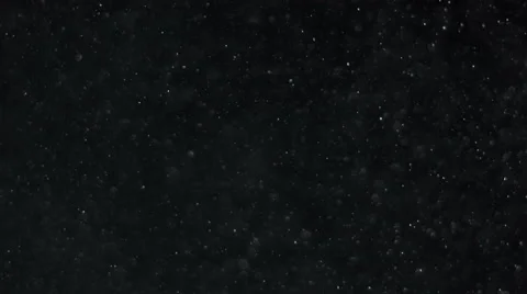 Dust particles and ashes floating in space like smoke, on black backgroundsnow Stock Footage 49967970
