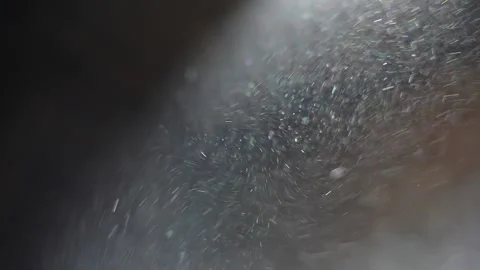 Dust particles are flying in the dark room Stock Footage 296413933