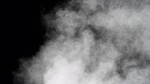 Dust particles ascending on the right side on black background, 4k Stock Footage 74388990
