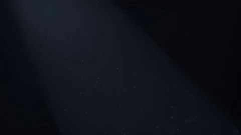 Dust particles in a black background Stock Footage 121992072