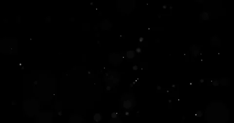 Dust particles on black background, seam... | Stock Video | Pond5