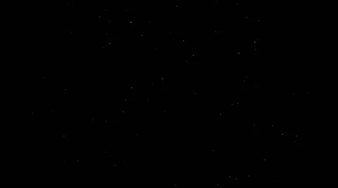 Dust Particles on Black Background slowly blown by Wind Stock Footage 60803578