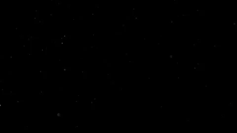 Dust Particles Floating In The Air Against A Dark Black Background. Stock Footage 302673001