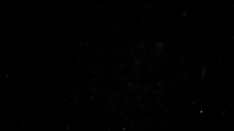 Dust particles floating on black background Stock Footage 125120270