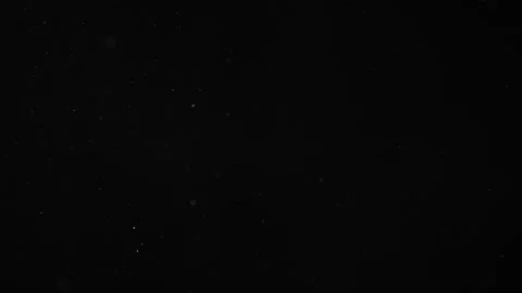 Dust Particles Floating On Black Background Video stock 247329784