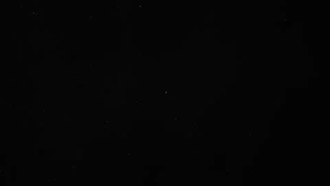 Dust Particles Floating On Black Background Video stock 247329919