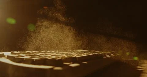 Dust Particles Floating Over Computer Keyboard Stockfoto's