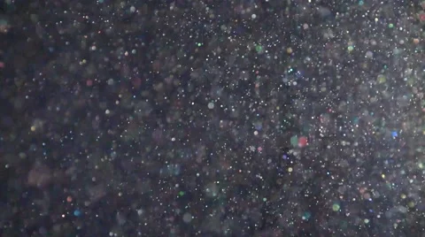 Dust particles floating in the sunlight Stock Footage 44826550