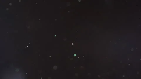 Dust particles fly abstract black bokeh background. Glitter sequins floating air Stock Footage 282511510