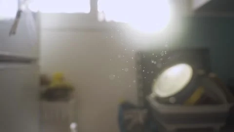 Dust particles fly and move slowly in the air inside a small household kitchen Stock Footage 131900074