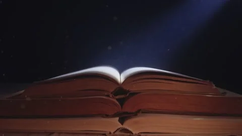 Dust particles flying in the moonlight over an opened old book. Stock Footage 146588443