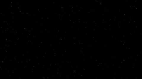 Dust particles flying over a black background Stock Footage 340960394