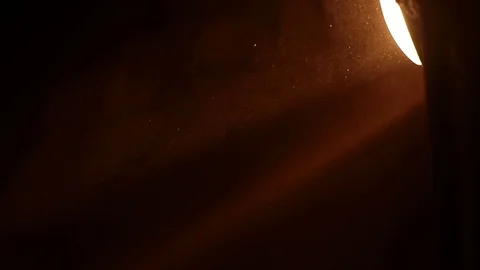 Dust Particles in front of a tractor light. Video stock 104407514