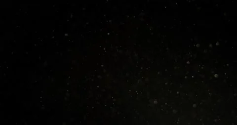 Dust Particles in motion in black screen. filmed with RED camera. 스톡 동영상 220407455