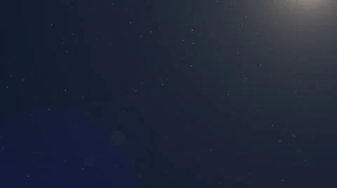 Dust Particles Moving Slowly in Sun Flare, Dark Blue Background Stock Footage 62690764
