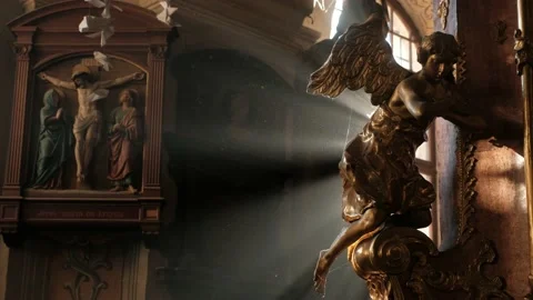 Dust particles shinning against a sunray coming from a window Inside the Church. Stock Footage 164997089